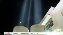 The Portrait of a Warrior Gallery lights the sky with search lights for Veterans Day