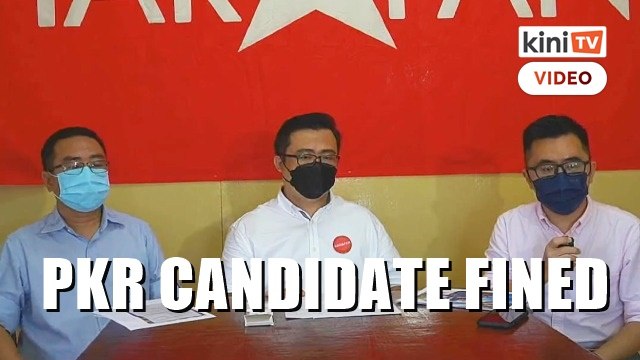 PKR candidate fined for 'walkabout' in party shirt