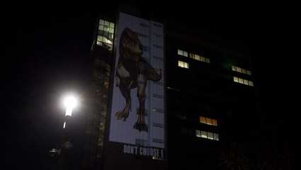 'Don't choose extinction!' Dinosaur display marks the end of COP26