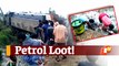 Petrol Tanker Overturns; People Scramble To Collect Spilled Oil