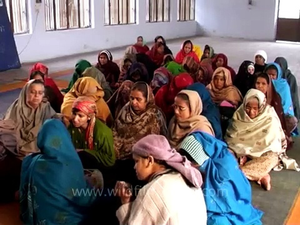 Women inmates in Tihar jail singing kirtans