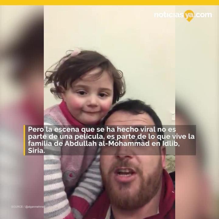 Padre sirio hace re%c3%adr a su hija en bombardeos para que crea que es juego.mp4
