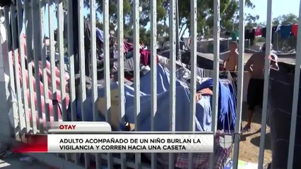 Migrante y su hijo burlan seguridad de garita de Otay y corren hacia la frontera