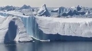 Large Iceberg Breaking Over