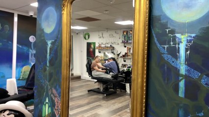 Artist Andy Burns Colwill Paints Tiger on Shop Wall to Speak out on Climate Change