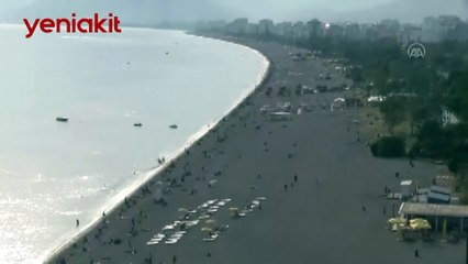 Plajda bu sefer çıplaklar değil, piknikçiler boy gösterdi!