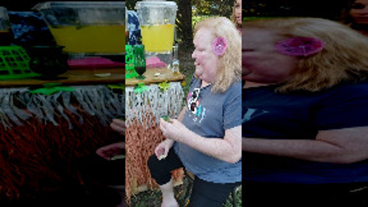 Lady Struggles With Libation