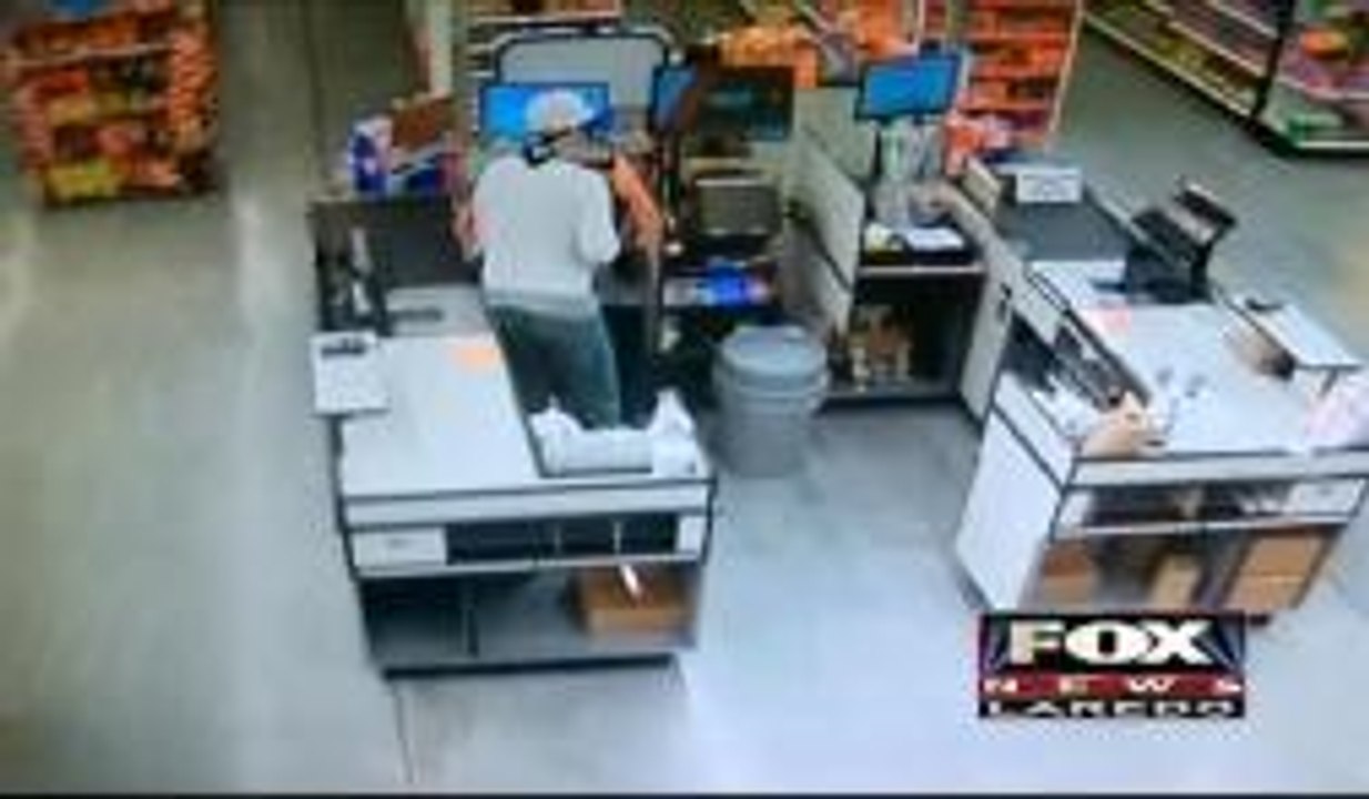 Supermarket Robbery At Gunpoint