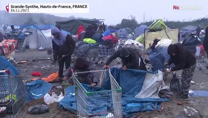 French authorities start moving migrants from camp in northern France