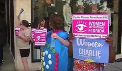 Mujeres Manifiestan contra Rick Scott