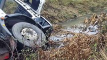 Driver rescued from ditch after roadsweeper crash