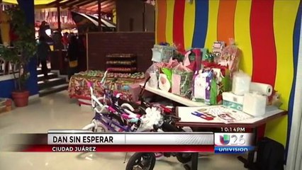 Niños reciben  un adelanto de la navidad de la organización "Dar sin Recibir"