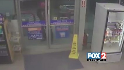 Suspect Sought in Armed Robbery Caught on Tape