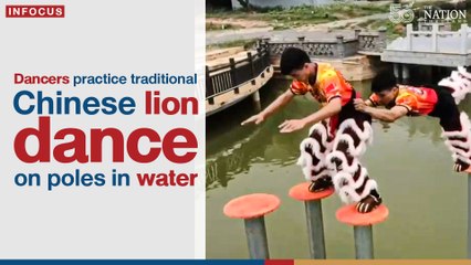 Dancers practice traditional Chinese lion dance on poles in water | The Nation Thailand