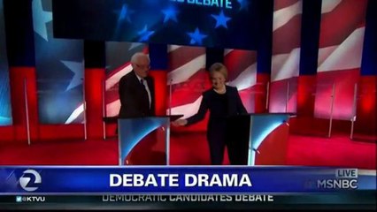CLINTON AND SANDERS FACE OFF AT DEBATE