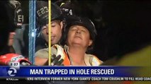 OAKLAND PLUMBER SAFELY RESCUED FROM HOLE