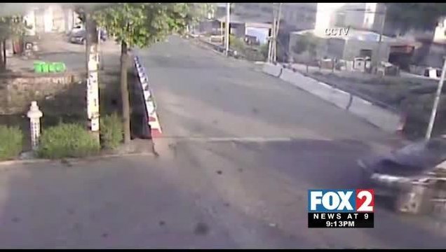 Caught on Camera: Car Crushed under Semi-Truck in China