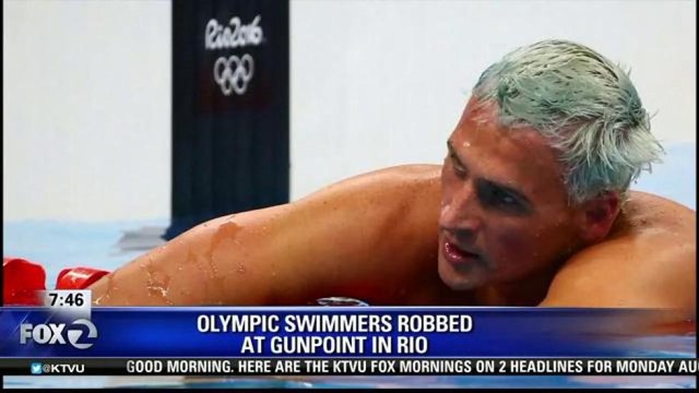 US OLYMPIC SWIMMERS ROBBED AT GUNPOINT IN RIO