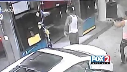 Two Men Hold Up A Man At Gas Station