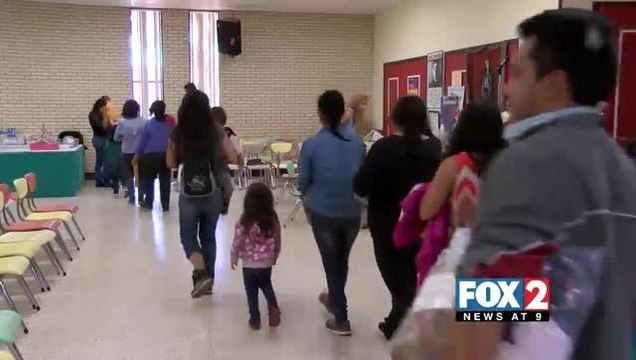 Hundreds Of Refugees Arrive Daily at Sacred Heart Church