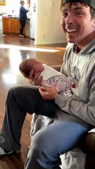 Infant Lifts Head for Nose Kisses