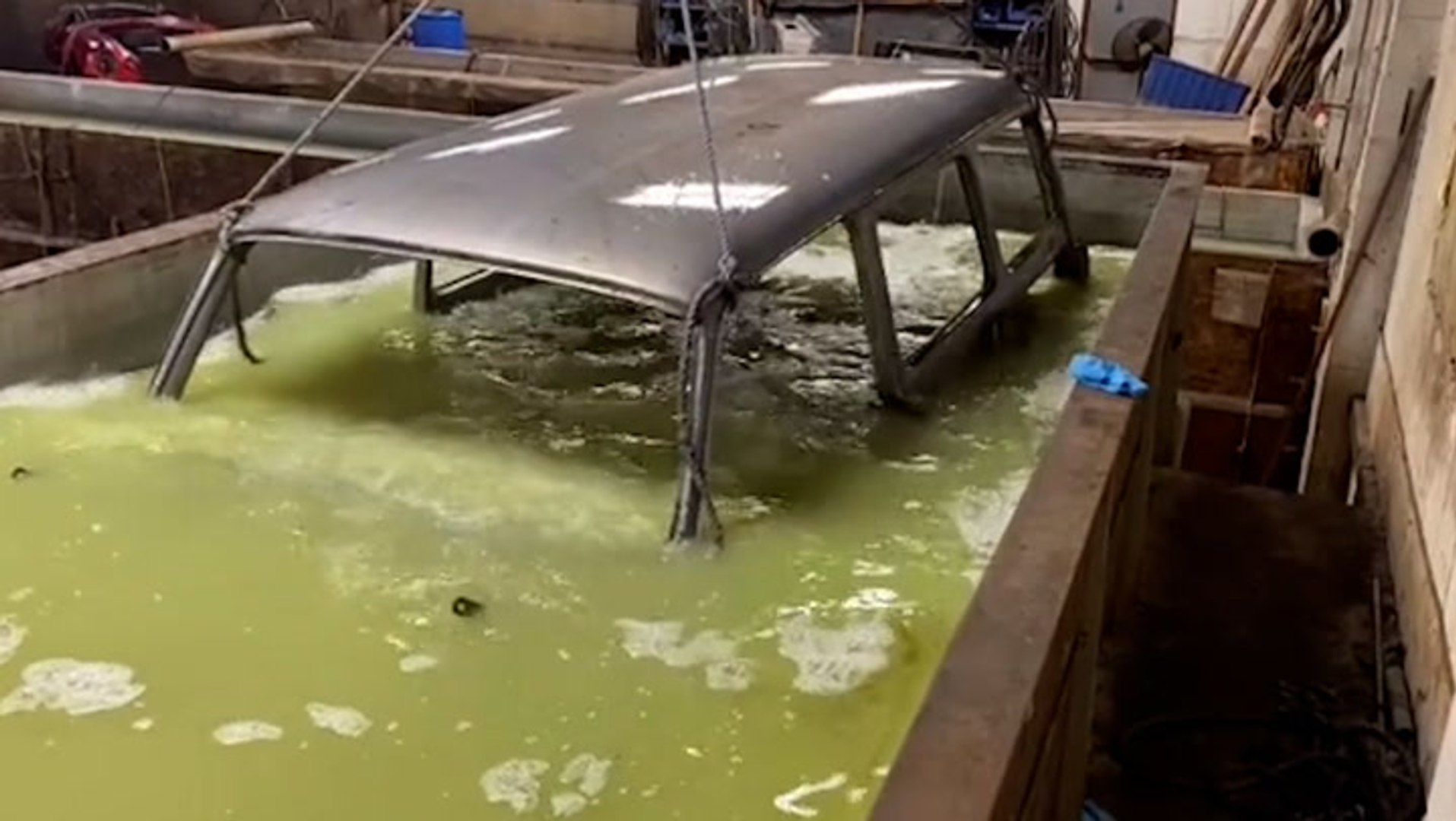 Chemical dipping removes years of paint and rust from vehicles