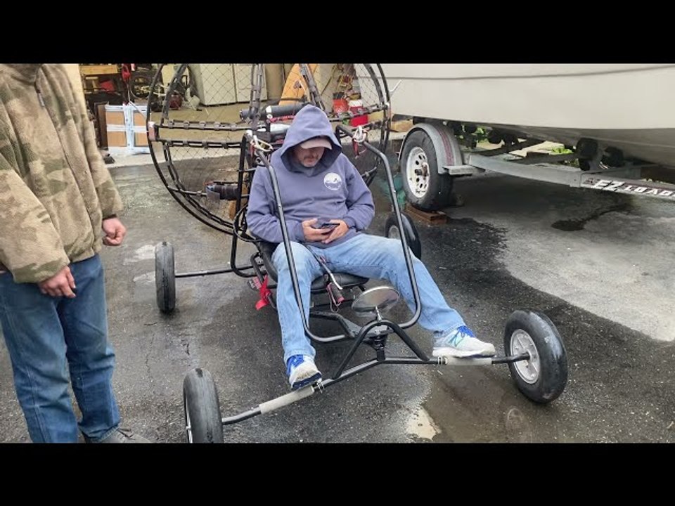 Paramotor Crashes Into Car