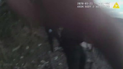 Police officers use belts to make hoist in Northfleet cliff rescue