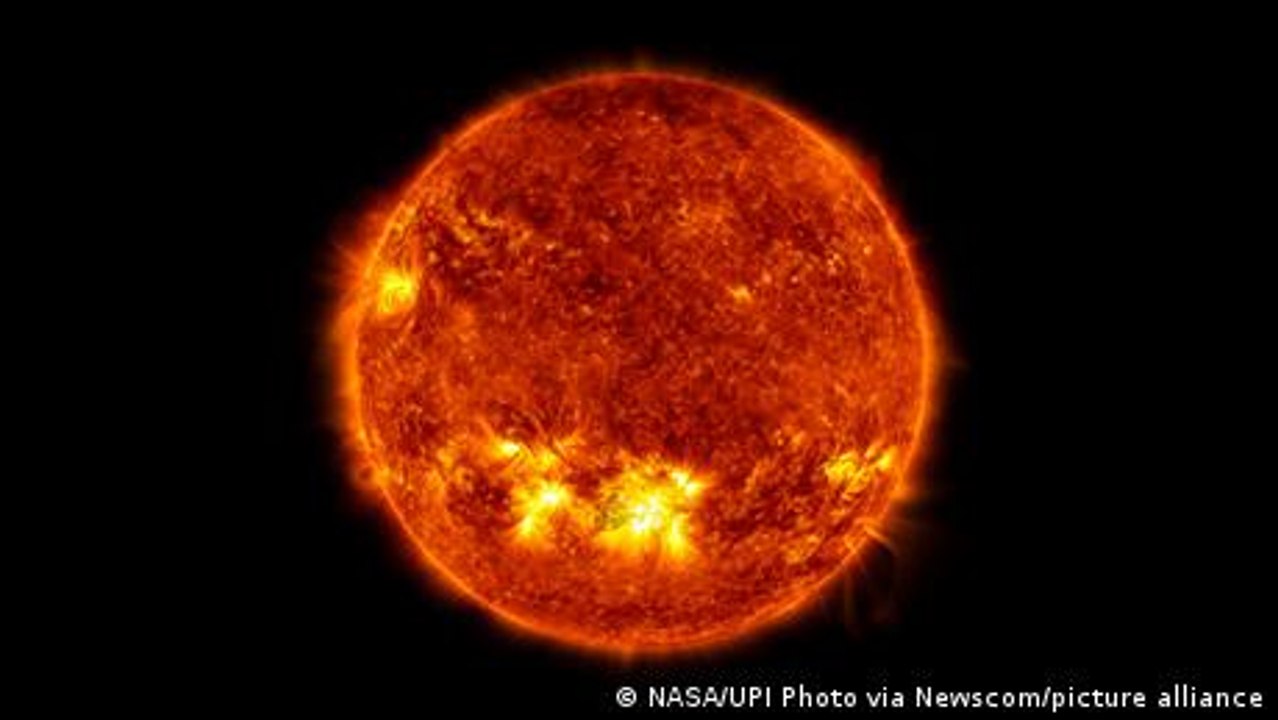 Does the sun rotate around its own axis?