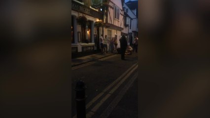 Man lays on ground following fight in Canterbury