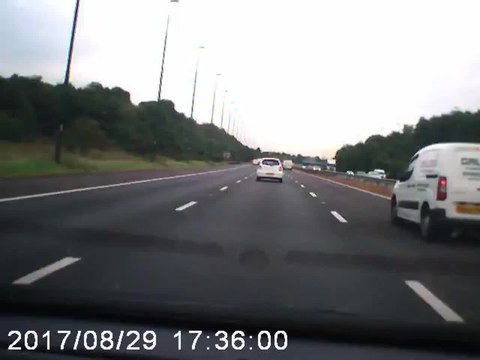 Terrifying moment lorry crashes into side of family car