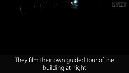 Two men film a tour of Ashford College at night