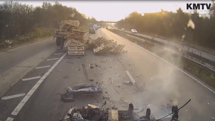 Moment dangerous driver ploughs into stationary traffic