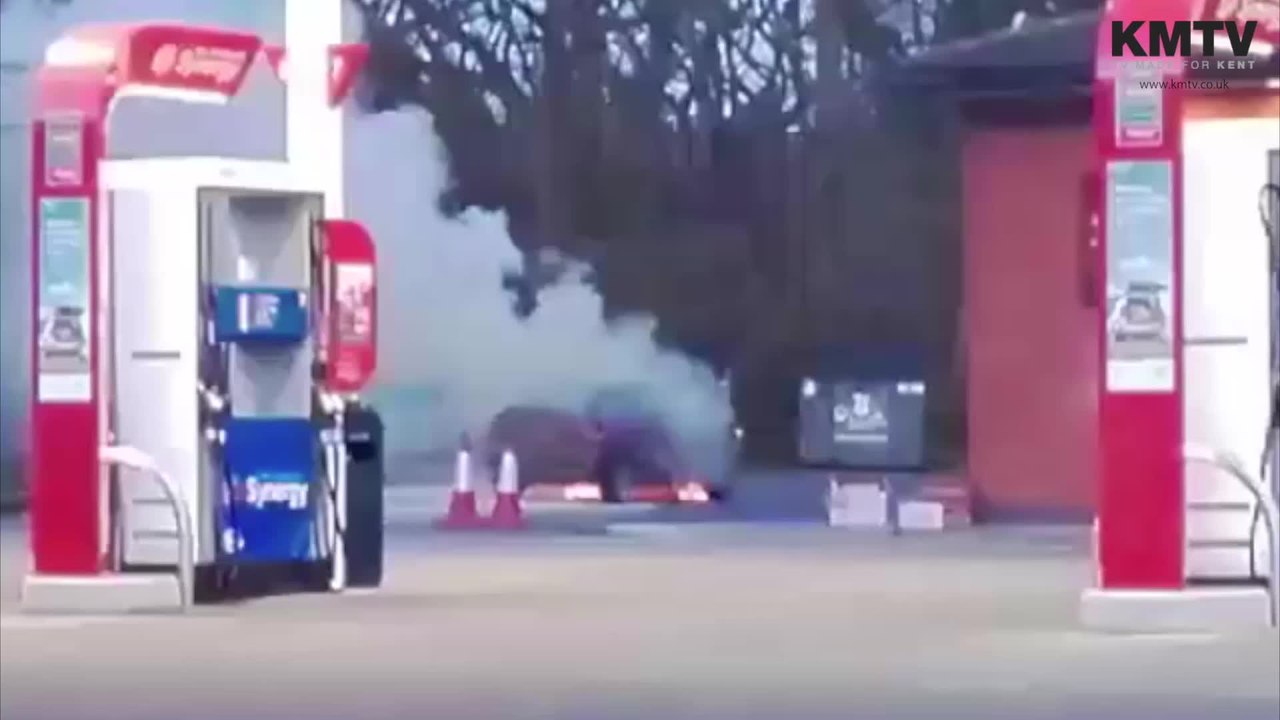 Car alight at Esso garage
