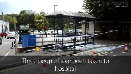 Three people taken to hospital after car ploughs into bus stop