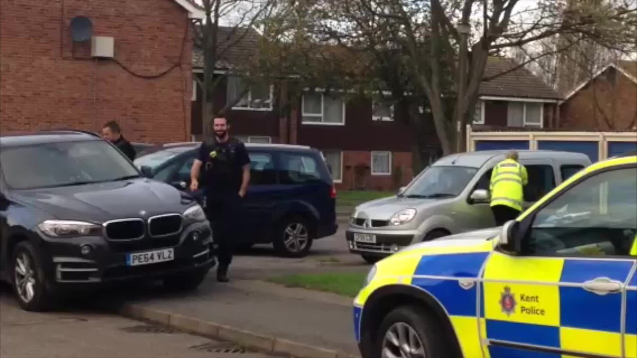 Armed police surround home
