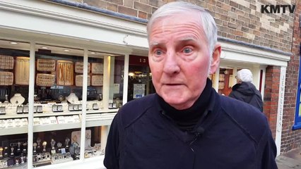 A heroic pensioner wrestled a masked robber