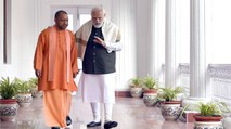 CM Yogi shares his pic with PM Modi, SP takes jibe