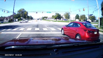 Red Light Runner Launched Into the Air After Accident