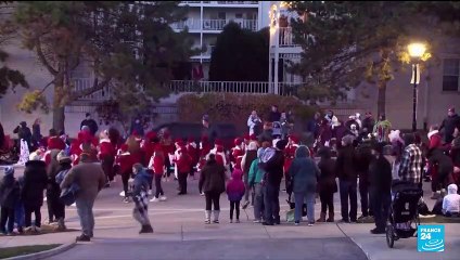 Vehicle strikes Christmas parade in US, killing five and wounding 40