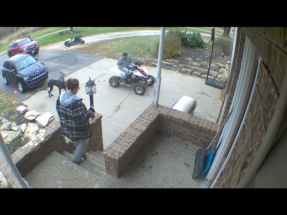 Dog Runs into Dad Parking Quad in Driveway