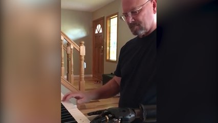 Amputee Learns How Play Piano With Prosthetic Arm