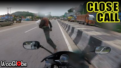 ''CLOSE CALL!' Motorcyclist ALMOST crashes into pedestrian during  EXTREME SPEED run '