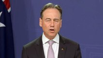 Greg Hunt says no travel bans yet after new COVID variant emerges in South Africa