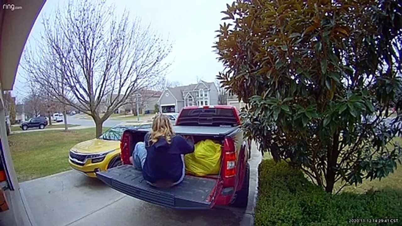 Woman Jumping Out of Truck Misjudges Height and Falls