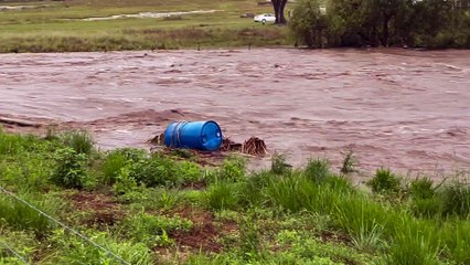 Backyard Becomes Raging Torrent During Flood Event