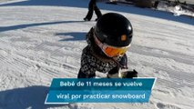 Sin saber caminar, bebé de 11 meses ya practica snowboard y conmociona las redes