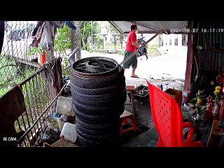 Motorcycle Rider Has Close Call With Falling Door