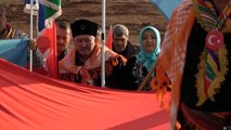 Son dakika haber! Türk ve Kazakistan bayraklarıyla yürüdüler, birlik ve beraberliğe dikkat çektiler
