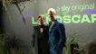 Olivia Colman poses on the red carpet with hubby Ed Sinclair